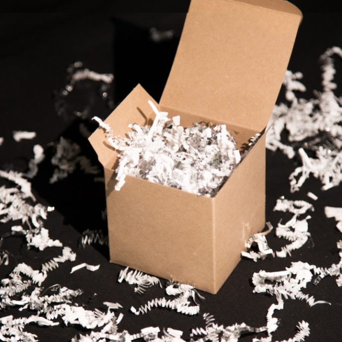 white and silver basket filler in a gift box